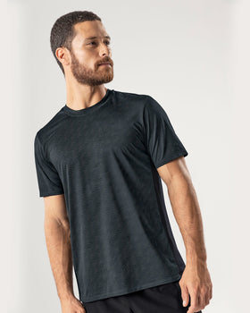 Camiseta tecnológica deportiva con mallas transpirables#color_798-estampado-ondas-gris