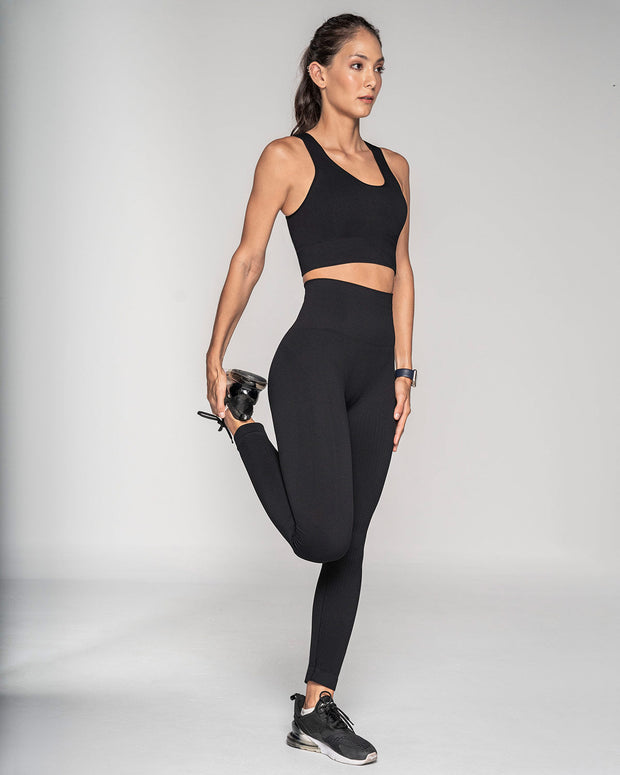 Legging sin costuras fajón doble tela en cintura y tensiones localizadas en piernas#color_700-negro